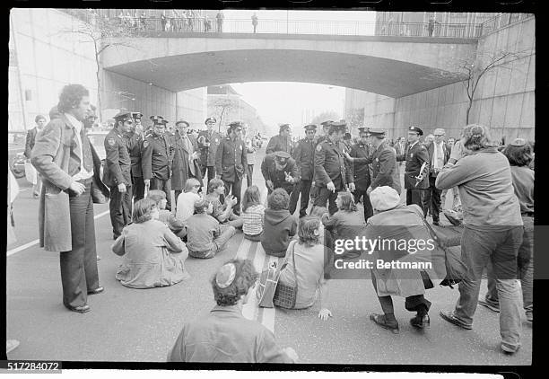 Members of the Jewish Defense League sit in the middle of East 42nd Street near the United Nations during protest against the UN's invitation to the...