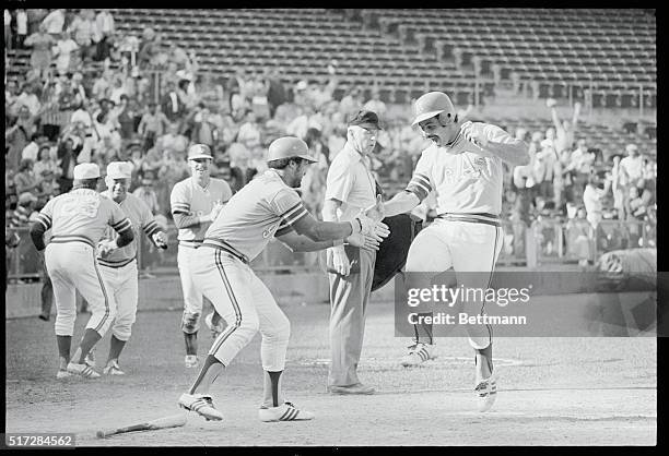 Oakland, Calif.: Oakland Athletics infielder Sal Bando goes up in the air in a dance for joy, as he scores the winning run in a game against...