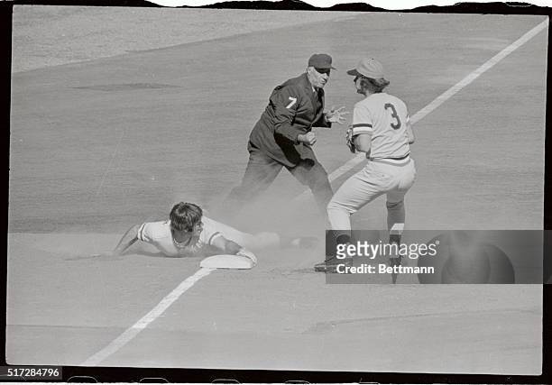 The Reds' Pete Rose is thrown out at third in the first inning 10/10 trying to advance from second on Bobby Tolan's grounder to Gene Allen. Pirates...