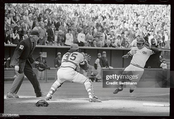 Reds' Johnny Bench is out at home after tagging up at third on Ronnie Stennett's fly to left in fourth inning 10-9. The double play ended the inning....