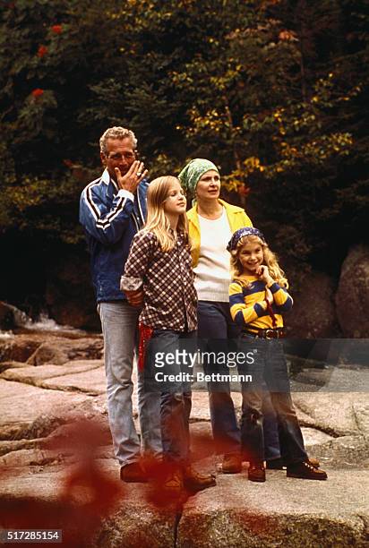 Paul Newman and wife, Joanne Woodward, shown with their daughters Melissa and Clea in area where they filmed a television special.