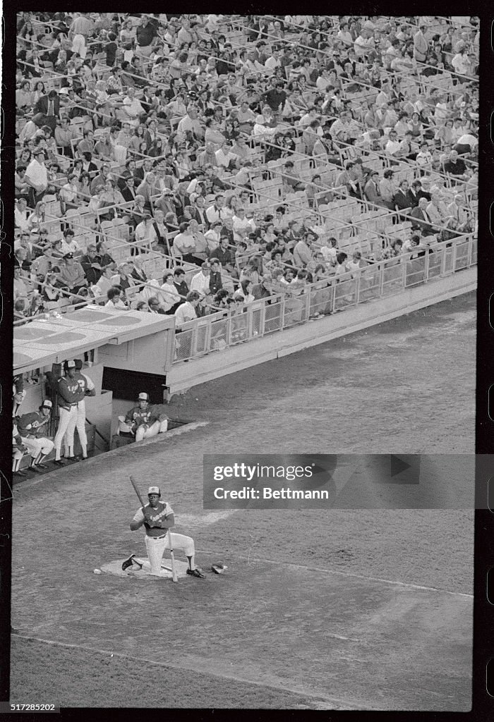 Hank Aaron Stretching While Waiting for Turn at Bat