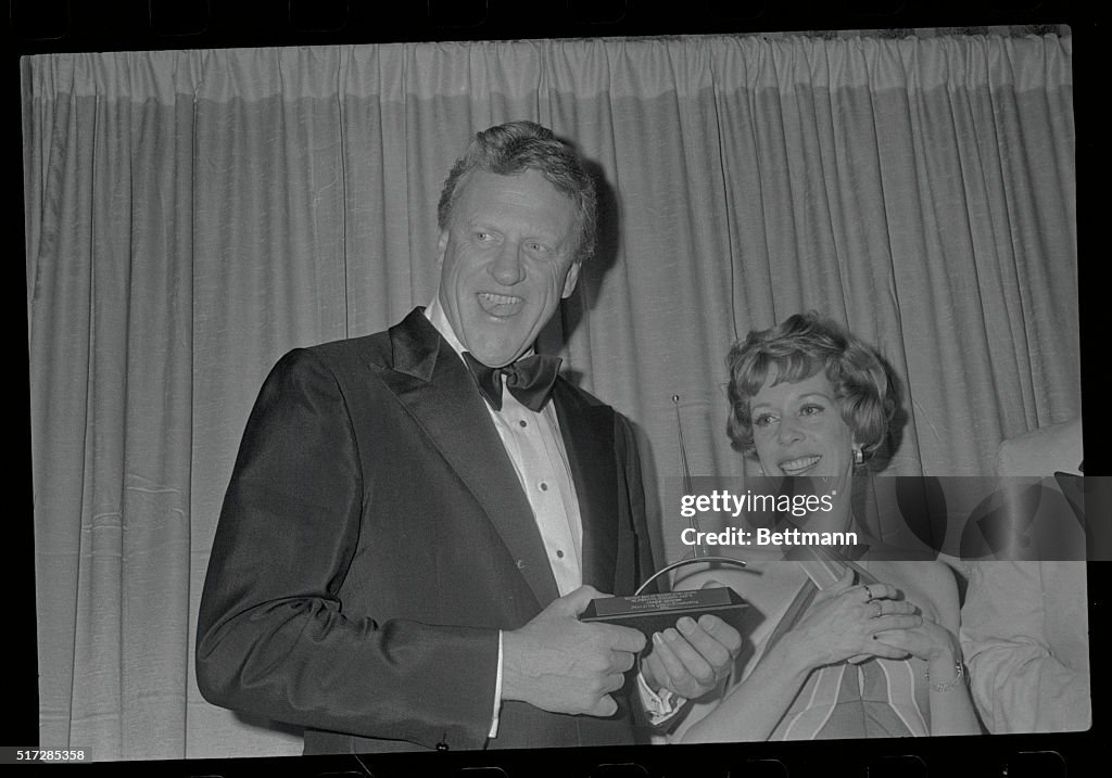 James Arness Holding an Award