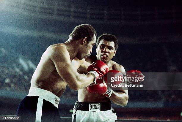 New York City: Full length view of the boxing action in the Muhammad Ali-Ken Norton Heavyweight Championship title bout. UPI color slide.