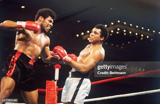 Muhammad Ali vs. Leon Spinks action during world heavyweight championship fight. Leon Spinks won the 15 round, split decision. Here, Spinks cocks...