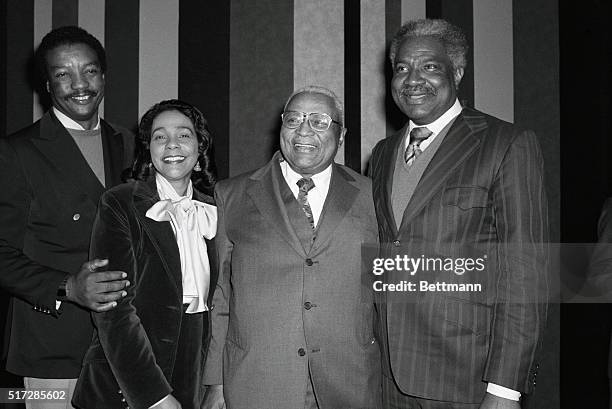 Taking a break in the filming of the television movie, King. Are left to right; actor Paul Winfield, Mrs. Coretta King, wife of the late Reverend Dr....