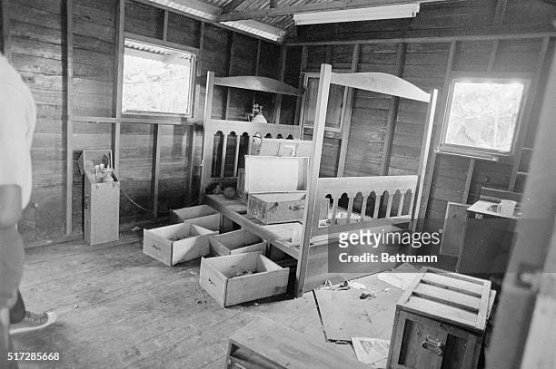 Photo shows Jim Jones' bed inside his living quarters at Jonestown.