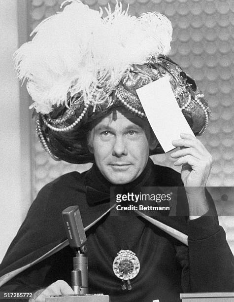 Johnny Carson plays the part of "Carnac the Magnificent" during an episode of The Tonight Show with Johnny Carson.