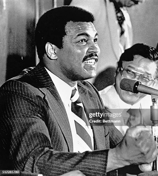 Muhammad Ali pounds the table with his fist as he announces during press conference 4/16 that he will meet World Boxing Council Heavyweight Champion...