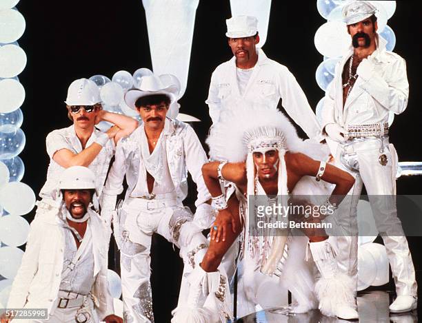 New York, NY: Group pose of the Village People in two scenes from the movie Can't Stop the Music, including original group member Alexander Briley.