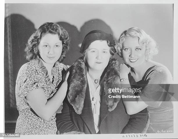 Group portrait of comic actress, Joan Blondell , who was a popular star of the First National film studio, with her sister Gloria and her mother.