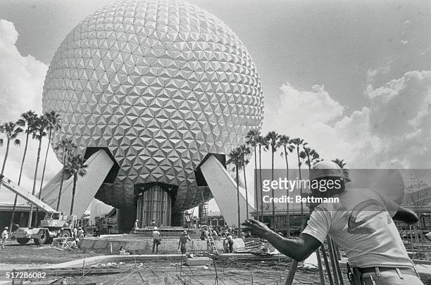 "Spaceship Earth" , part of the Epcot Center, that is, Walt Disney's billion-dollar dream-come-true---rises above two of the nine World Showcase...