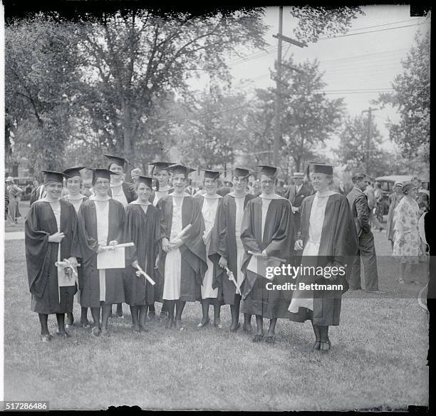 This group of smiling Seniors entered Mt. Holyoke College Mass., in a body, followed the same course of studies and dwelled together during the four...