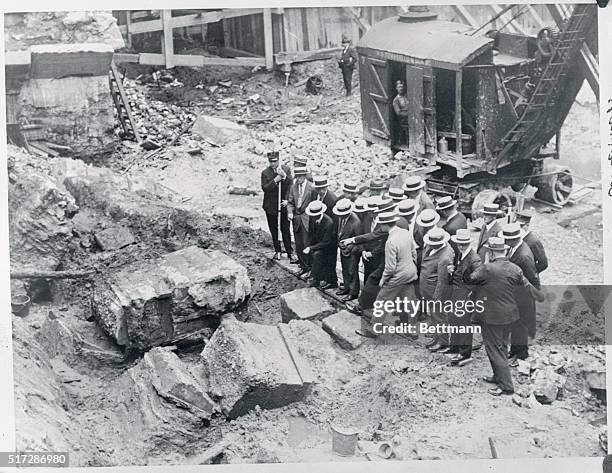 Shows grand jury making a close inspection of the foundation of the tragic Pickwick Club.