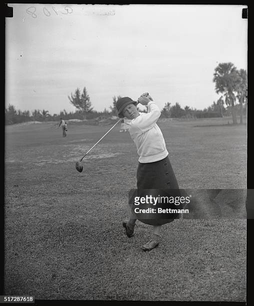 Miss Patty Berg, 17-year-old star of Minneapolis, MN, shown as she took part in the first round of the Florida Women's Golf Championship at Palm...