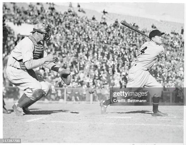 Here is Joe Cronin hoisting a long one when the willow met the sphere in the benefit game played recently at San Francisco, California. Ernie...