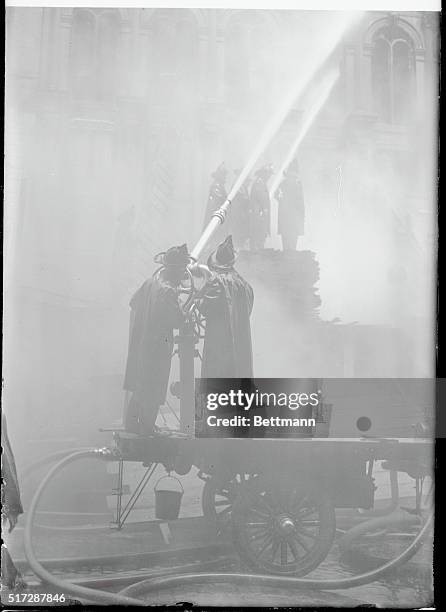 New York: Chemical Soaked Building Ablaze Stifles Manhattan with Smoke. Fighting a spectacular battle against the flames in the 100 year old McKesson...