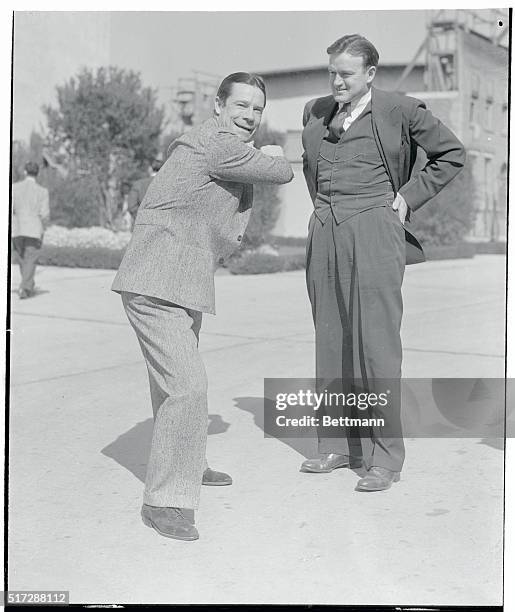 Joe E. Brown, movie actor with a soft spot in his heart for baseball, is shown discoursing on that topic with Joe Cronin, new manager of the Boston...