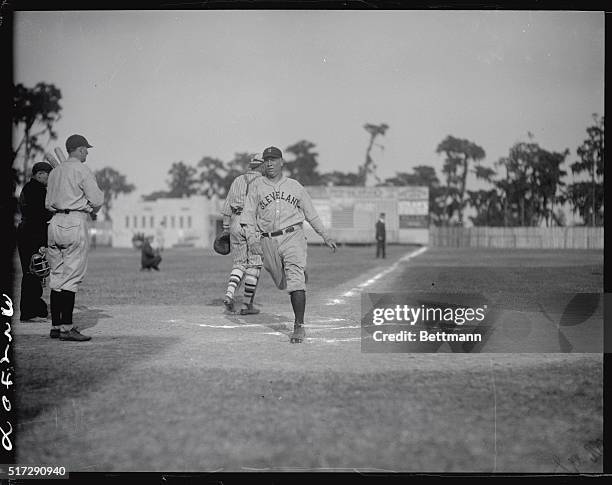 Scoring on Jackson's error in the sixth inning of exhibition game with the New York Giants.