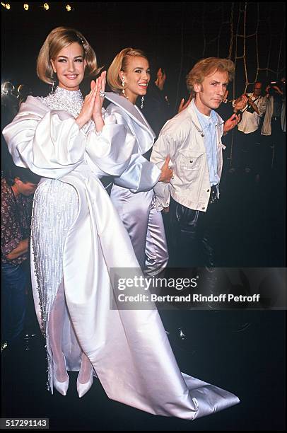 Karen Mulder and Emma Sjoberg and the fashion designer Claude Montana - Lanvin Haute Couture fashion show fall winter 1992-1993 collection in Paris.