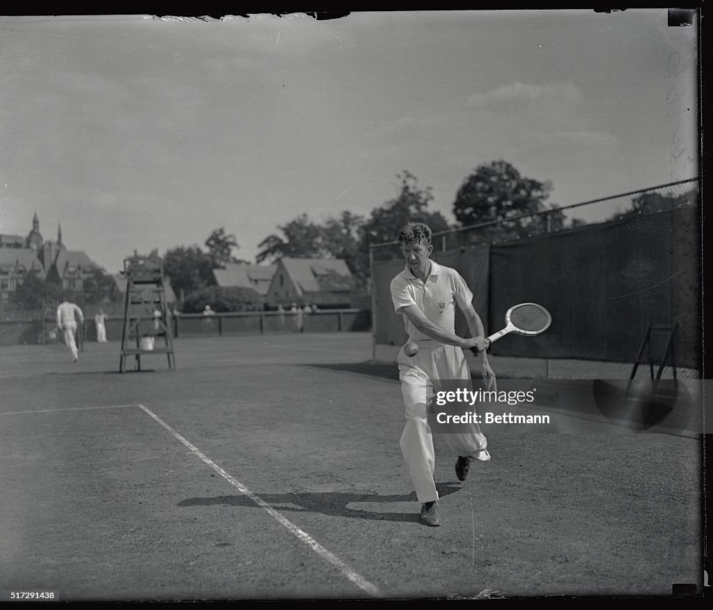 Donald Bugde in Tennis Action