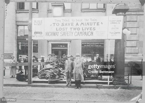 Canton, Ohio: Unique Warning To Motorists. ..."To save a minute, two lives lost," is the slogan placed over the wreckage of an automobile which was...