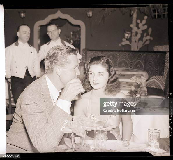 Brenda Rag 6/12/1939- New York, NY- Film player Bruce Cabot is pictured with ...
