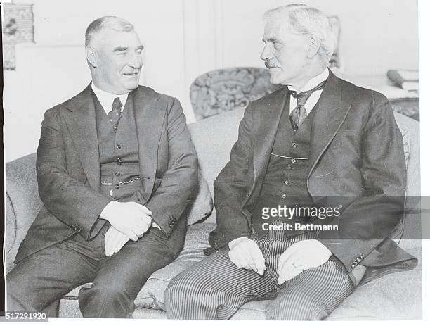 Britain's Premier Confers with Premier of New Zealand. London, England: Prime Minister Ramsay MacDonald holds a friendly conversation with Premier...