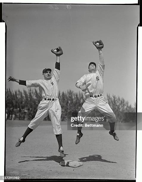 These two men are fighting for the second base post with the New York Yankees in spring training camp. They are William Knickerbocker, with the St....