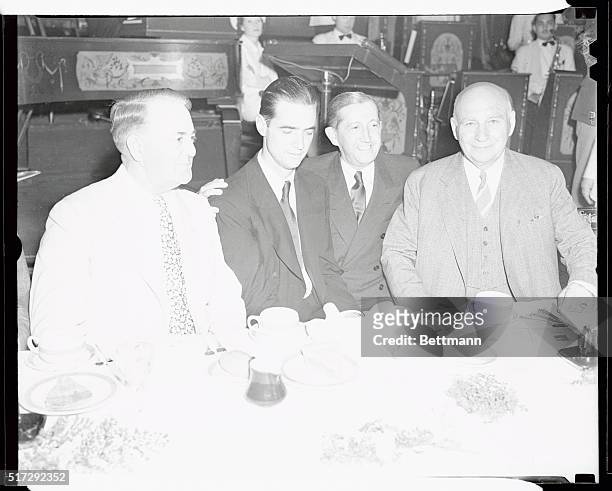 Mayor Frank L. Shaw of Los Angeles, Howard Hughes, Will Hays, "Czar" of the movies, and Governor Frank Merriam of California are pictured at the...