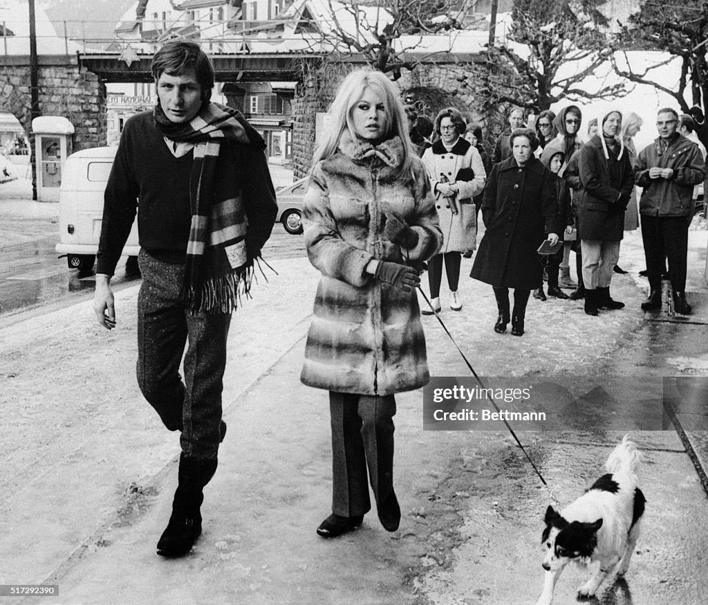 Brigitte Bardot and Husband Walk the Dog