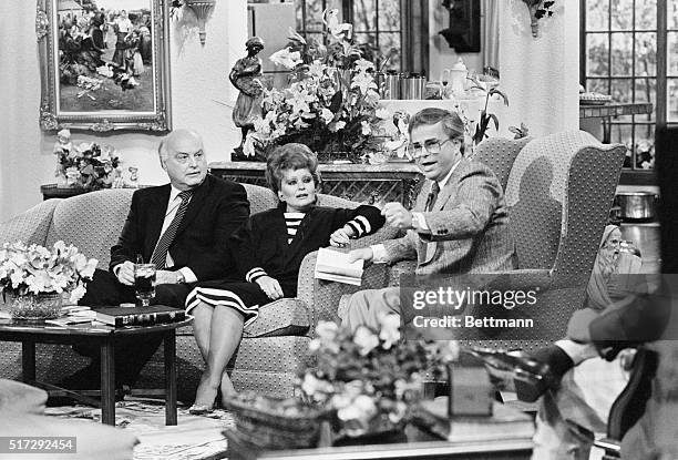 Jim Bakker and wife Tammy sit with Edwin Louis Cole, a guest on their program, "People That Love", on April 28, 1986. Jim Bakker is a tele-evangelist...