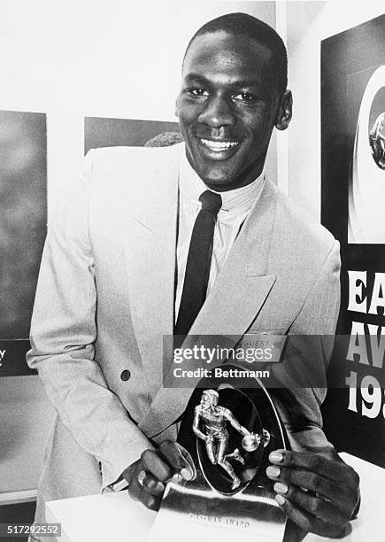 Junior guard Michael Jordan of the University of North Carolina accepts the Eastman Award as the nation's top collegiate basketball player. March 27,...