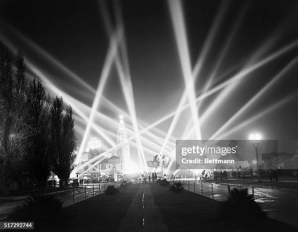 Searchlights light up the sky over Hollywood at the 1940 film premiere of Charles Chaplin's The Great Dictator.