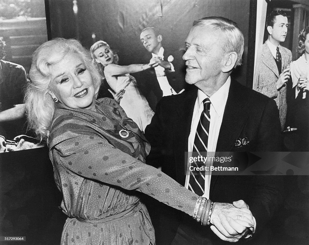 Ginger Rogers and Fred Astaire Dancing at Luncheon
