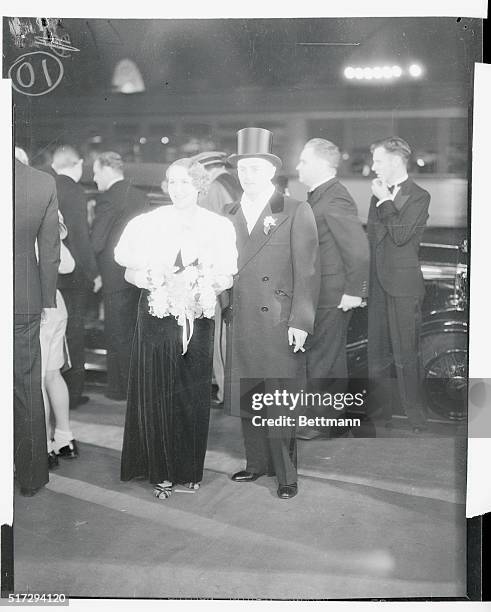 Los Angeles: Movie Lights at Film Premiere. Mr. And Mrs. Daryl Zanuck shown as they arrived at the United artists Theater in Los Angeles to attend...