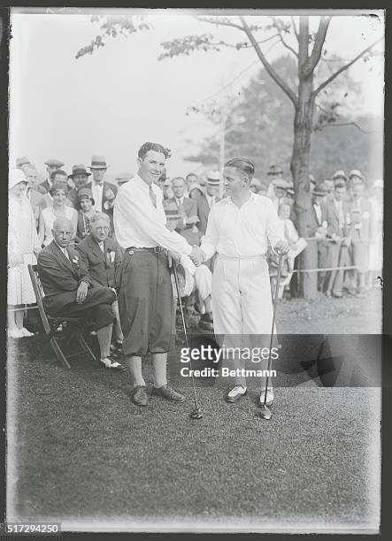 Fay Coleman shaking hands with Bobby Jones at the National Amateur Golf Championship.