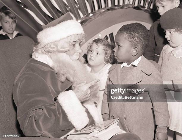 Old Kris Kringle, togged out in his Christmas Day dress, paid an unexpected and early visit to this youngster's home to see how things were going....