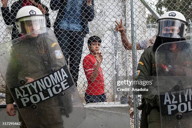 Refugees are seen at the refugee camp in Morea, Greece on March 24, 2016. Refugees staged protest against EU's deportation agreement.