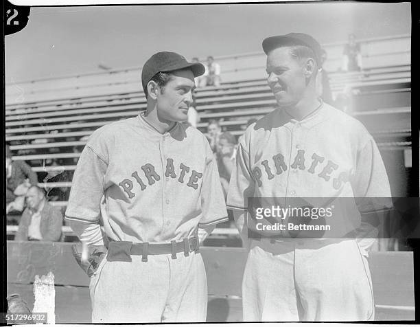 Guy Bush, pitcher, and Babe Herman, outfielder, are pictured during a recent practice session of the Pittsburgh Pirates, at their spring training...