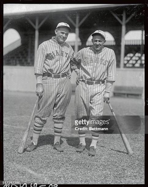 Photo shows Rogers Hornsby and Mueller, both of whom are now with the New York Giants, were formerly with the St. Louis Cardinals.