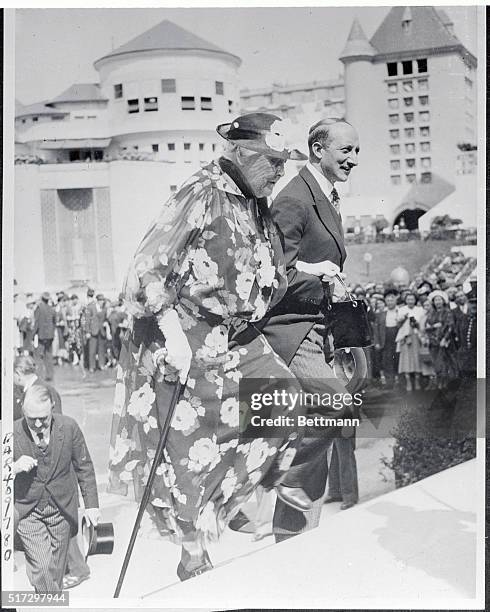 Mrs. James Roosevelt, as she was escorted by Georges Bonnet, French Minister of Finance and former Ambassador to Washington, when she visited the...