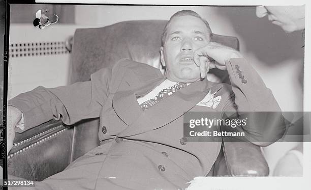 Dizzy Dean, irrepressible Cardinal Hurler, pauses quietly to ponder his position in his present difficulty with Ford Frick, president of the National...