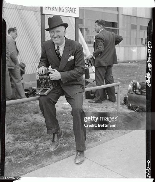 Here is William B. Springfield, Acme's Philadelphia photographer, who was assigned to cover the arrival of the airship Hindenberg at Lakehurst, NJ,...