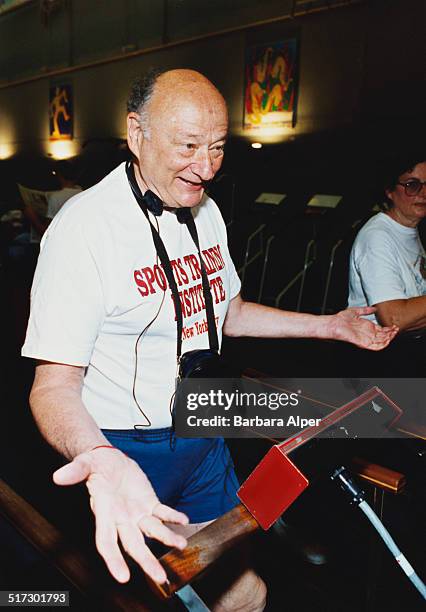 American lawyer, politician, political commentator, and past mayor of New York City, Ed Koch exercising at the Sports Training Institute, New York...