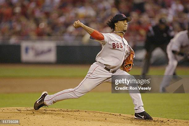 Pitcher Pedro Martinez of the Boston Red Sox pitches during game three of the 2004 World Series against the St. Louis Cardinals at Busch Stadium on...