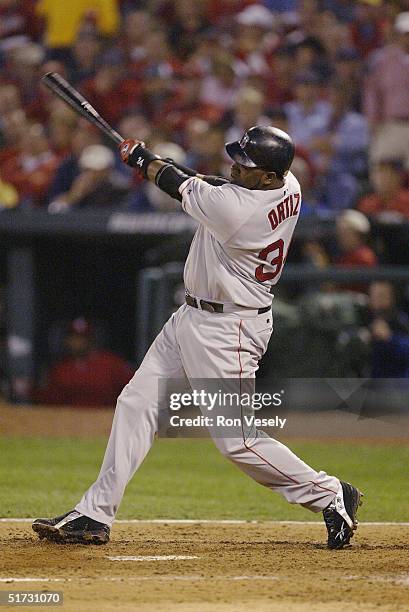 David Ortiz of the Boston Red Sox bats during game three of the 2004 World Series against the St. Louis Cardinals at Busch Stadium on October 26,...