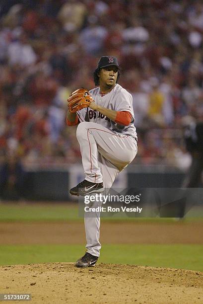 Pitcher Pedro Martinez of the Boston Red Sox pitches during game three of the 2004 World Series against the St. Louis Cardinals at Busch Stadium on...