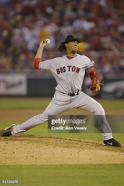 Pitcher Pedro Martinez of the Boston Red Sox pitches during game three of the 2004 World Series against the St. Louis Cardinals at Busch Stadium on...