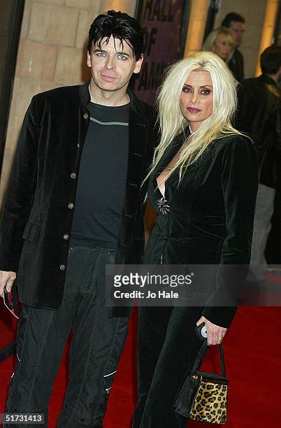 Singer Gary Newman and his wife Gemma arrive at the final of "UK Music Hall Of Fame", the Channel 4 series looking at popular music from the 1950's...